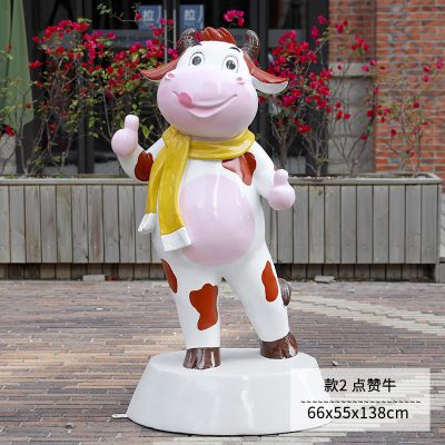 商店門(mén)口一只點(diǎn)贊的玻璃鋼牛雕塑